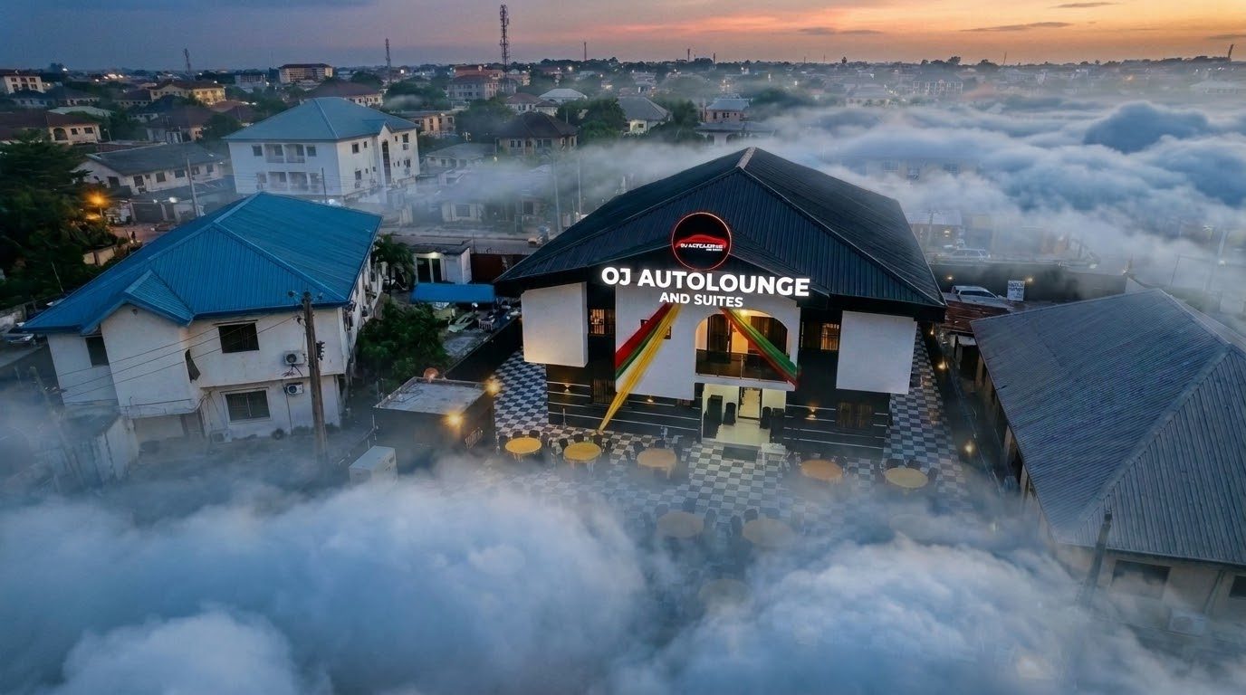 Aerial view of the property at sunset, with low cloud across the neighbourhood