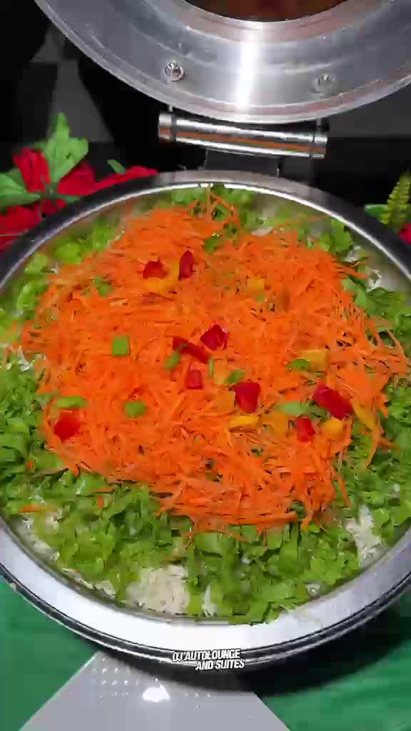 A tray of carrot and pepper rice from the opening event